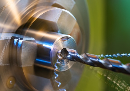 Machine drilling into a part during Precision Machining in Columbia SC