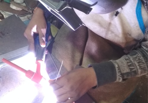 A welder is seen at work. SMF offers Welding Service in Charleston SC.