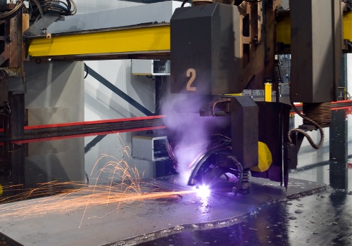 A plasma cutter is seen. SMF offers Plasma Cutting in Greenville SC.