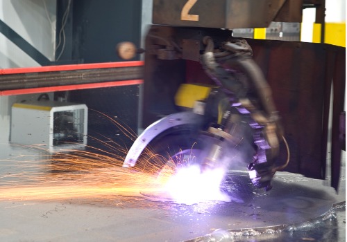 A plasma cutter is seen in action. SMF offers plasma cutting in Columbia SC.