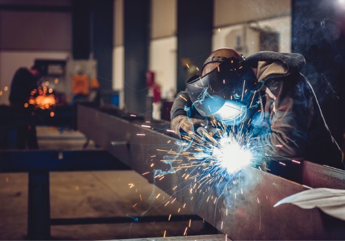 A welding job is seen in a factory. SMF performs custom metal fabrication.