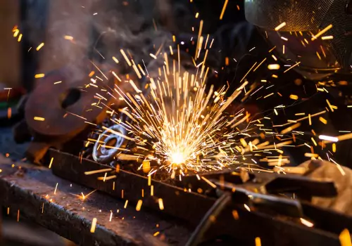 Professional metalworking is seen. SMF offers Custom Metal Fabrication in Greenville SC.